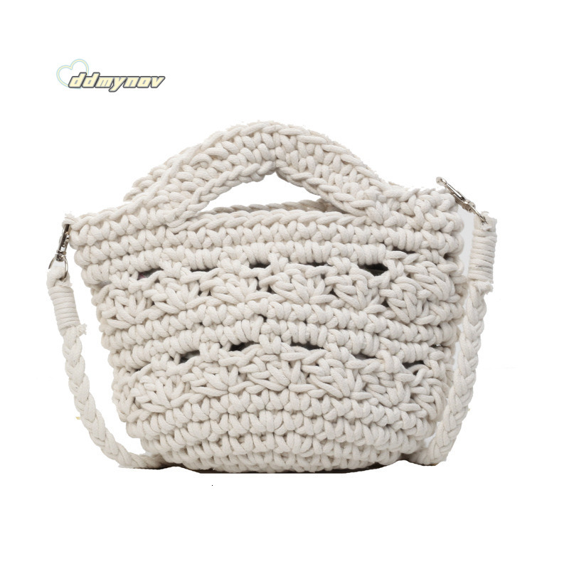 2025 New Large Capacity Women's Artistic Handwoven Hollow Bucket Beach Simple Crossbody Bag ddmynov