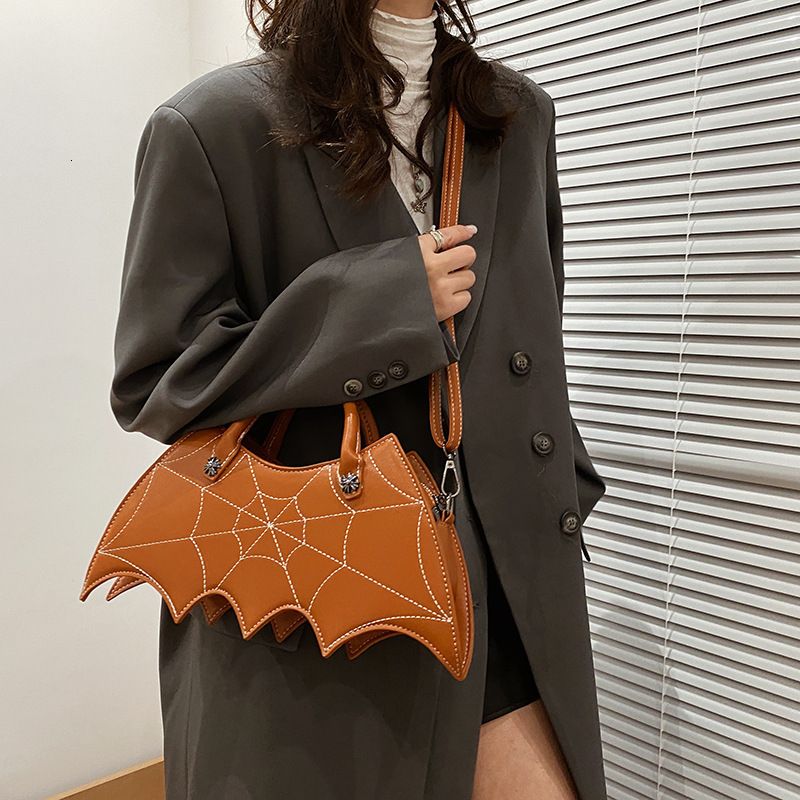 Free Shipping 2025 New Designer Bag Fashion Boutique Shopping Bag Creative And Funny Halloween Personality Bat Girl Fashion PU Handbag