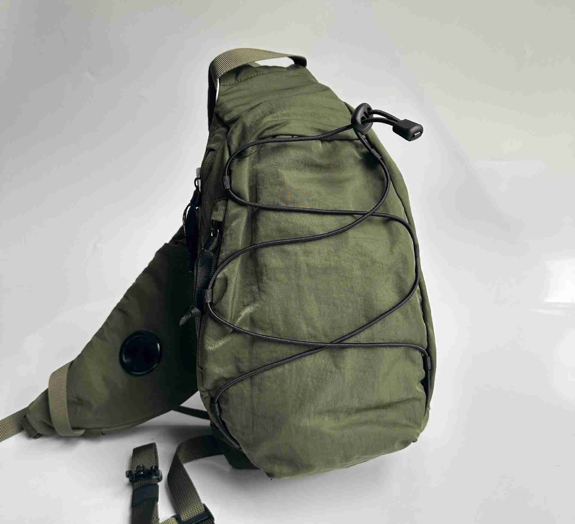 2025--Single Shoulder Crossbody Small One Lens Outdoor Sports Pull Rope Classical Chest Casual Waist Bag Unisex sling Packging