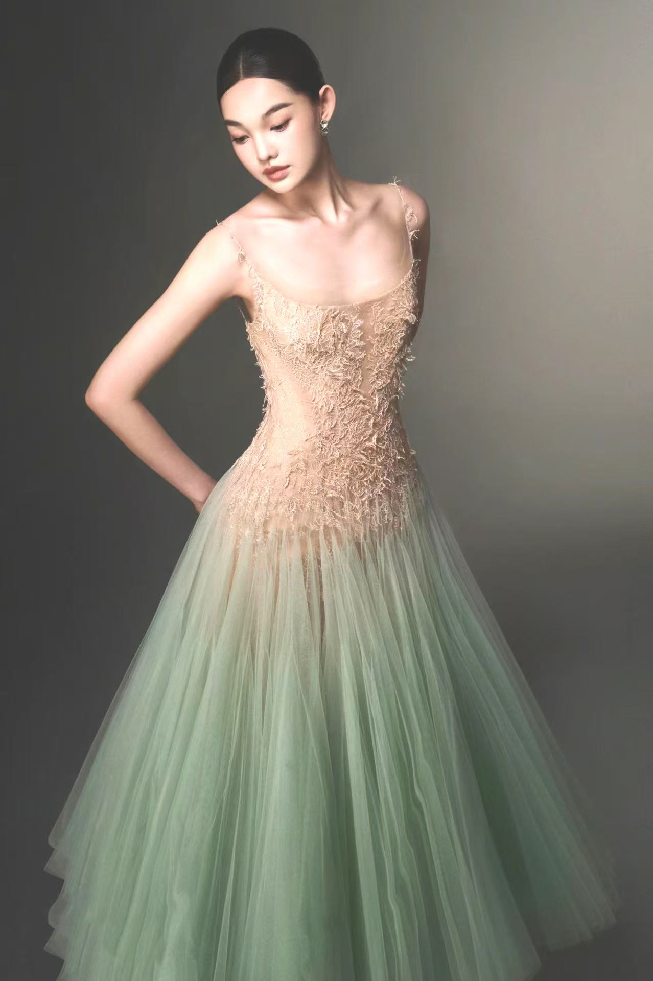 Vietnamese lace-embroidered mint green halter dress for summer 2024, with ultra-genteel and niche design, featuring slimming net fabric.