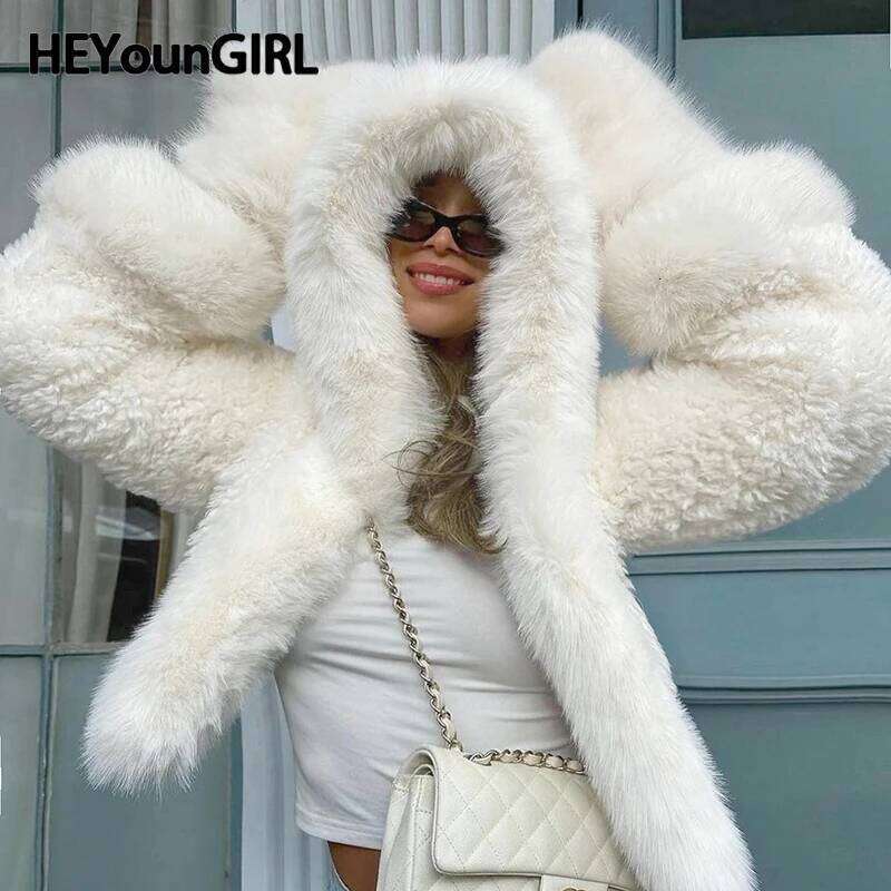 HEYounGIRL Faux Fur Hooded Coat Women Fashion High Street Fluffy White Snow Jacket Winter Warm Slim Outwear Stylish Lady Outfits