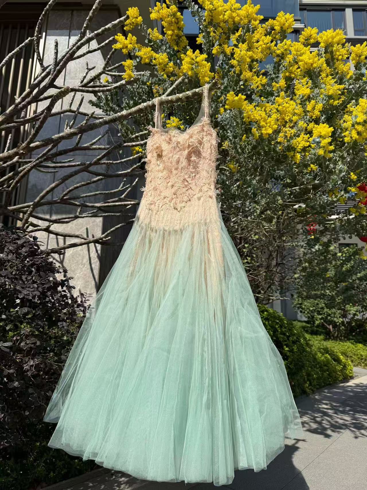 Vietnamese lace-embroidered mint green halter dress for summer 2024, with ultra-genteel and niche design, featuring slimming net fabric.