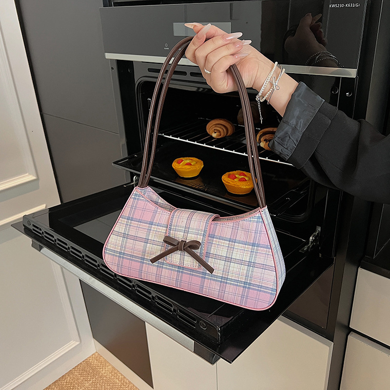 Free Shipping 2025 New Designer Bag Fashionable And High-quality Shopping Bag Niche Color Blocked Striped Women's Commuting Shoulder Handbag