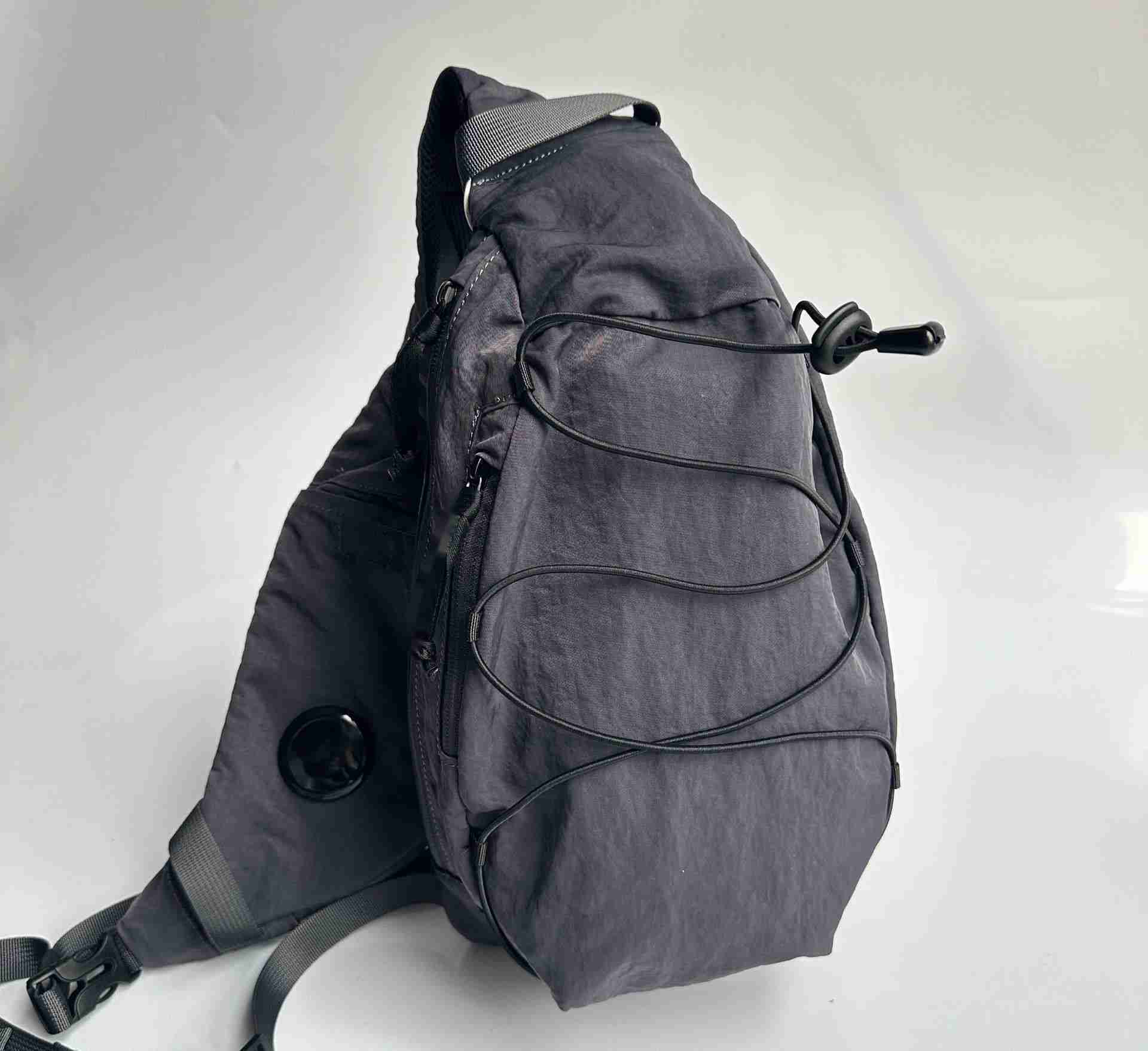 2025--Single Shoulder Crossbody Small One Lens Outdoor Sports Pull Rope Classical Chest Casual Waist Bag Unisex sling Packging