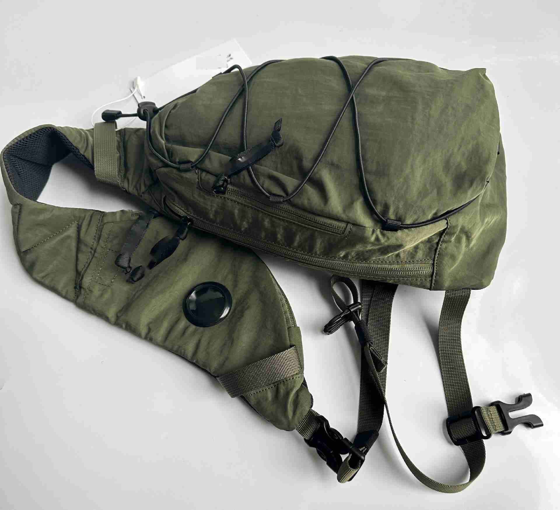 2025--Single Shoulder Crossbody Small One Lens Outdoor Sports Pull Rope Classical Chest Casual Waist Bag Unisex sling Packging