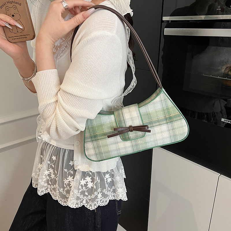 Free Shipping 2025 New Designer Bag Fashionable And High-quality Shopping Bag Niche Color Blocked Striped Women's Commuting Shoulder Handbag