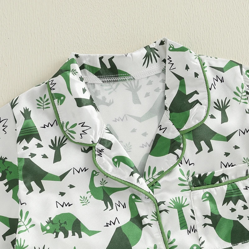 Boys Summer Pajama Set with Fun Dinosaur Print Short Sleeve Button Down Top and Matching Shorts for Comfortable Lounge Wear 250617