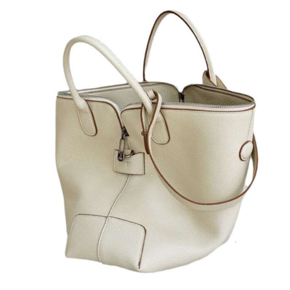 Handheld Tote for Women New Light Luxury Niche High end Fashion Commuter Versatile Crossbody Bucket Bag
