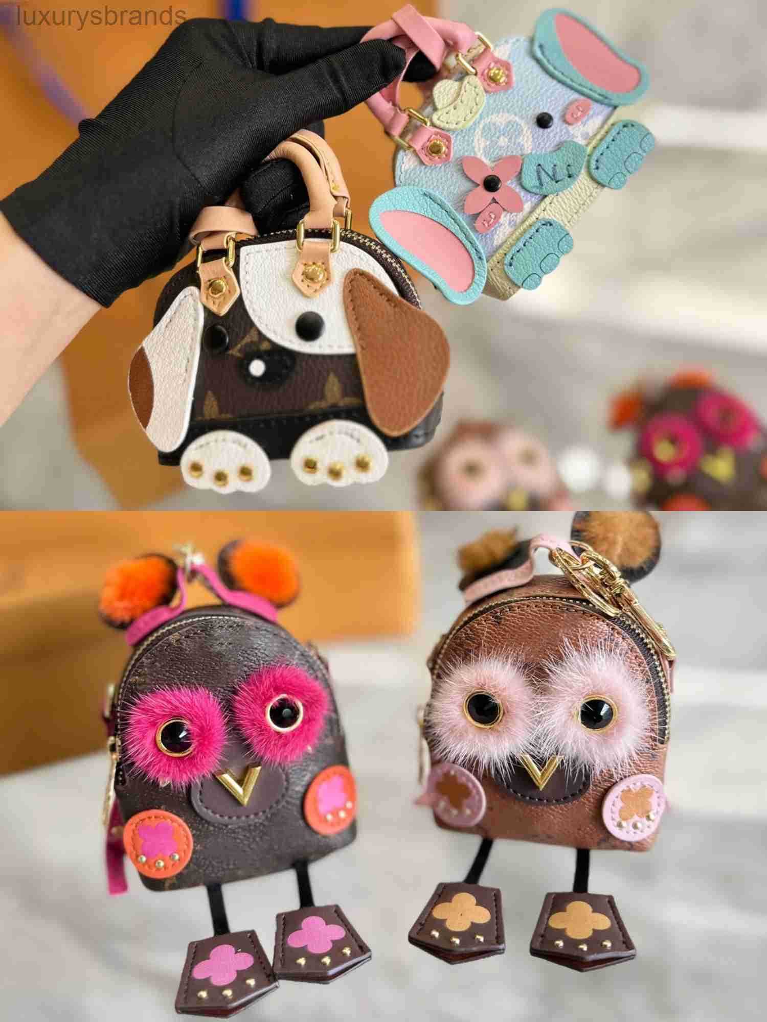 Designer Keychains Luxury Brand Women Key Wallets Designer Dog Elephant Shell Coin Purses Keychain Cute Owl Mini Backpack Ladies Zipper Card Bags Clutch Bag Totes Pe