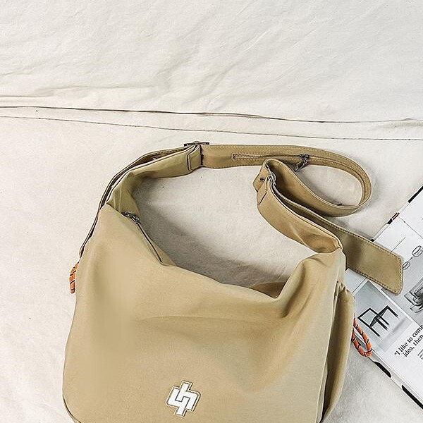 Free shipping designer Outdoor Cycling Nylon Bag for Women Large Capacity 2025 New Casual Simple Dumpling Bag Crossbody Bag with a Sense of Sophistica