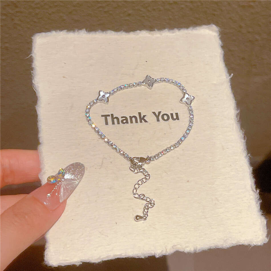 Light Fashion High-end Super Shiny Micro-inlaid Full Zircon Four-leaf Flower Bracelet Exquisite Personality Versatile Design Jewelry
