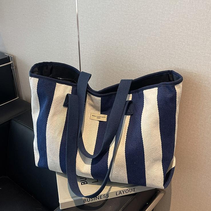 Free shipping designer Striped Canvas Bag for Women 2025 New Simple Versatile Casual Shoulder Bag Large Capacity High-end Commuter Tote Bag