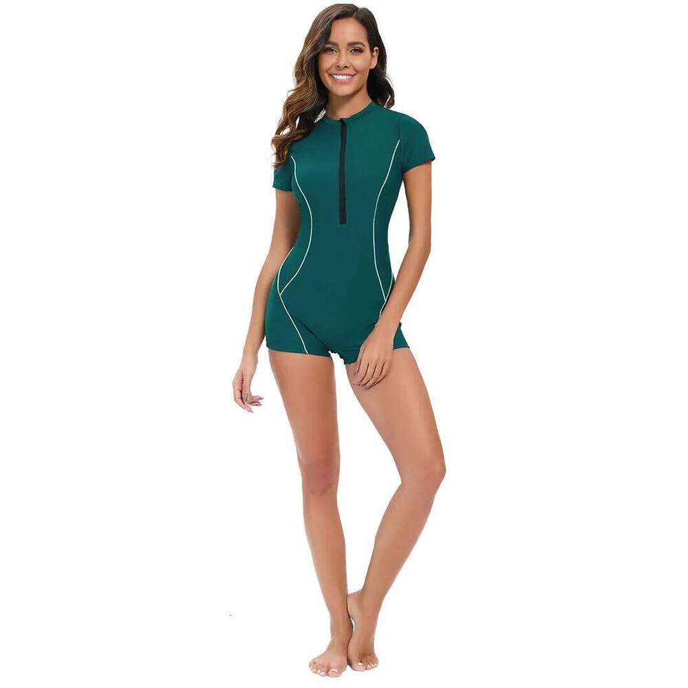 New solid color short sleeved sexy jumpsuit from Europe and America Women's conservative flat angle swimsuit