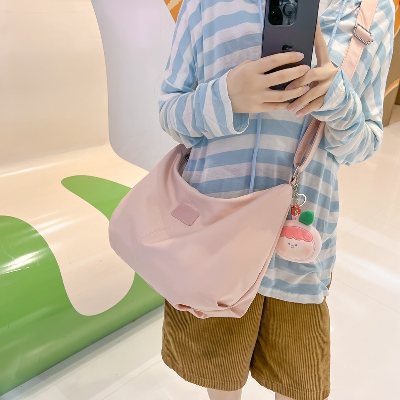 Free shipping designer 2025 New Japanese Style INS Large Capacity Shoulder Bag for Women Casual Dumpling Bag for Students Class Commuting Crossbody Ba