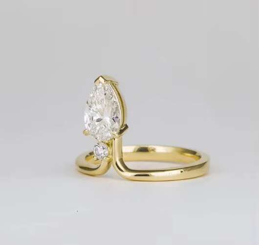 1.06 Ct Elongated Pear Cut Moissanite Engagement Ring Elegant and Durable Wedding Band
