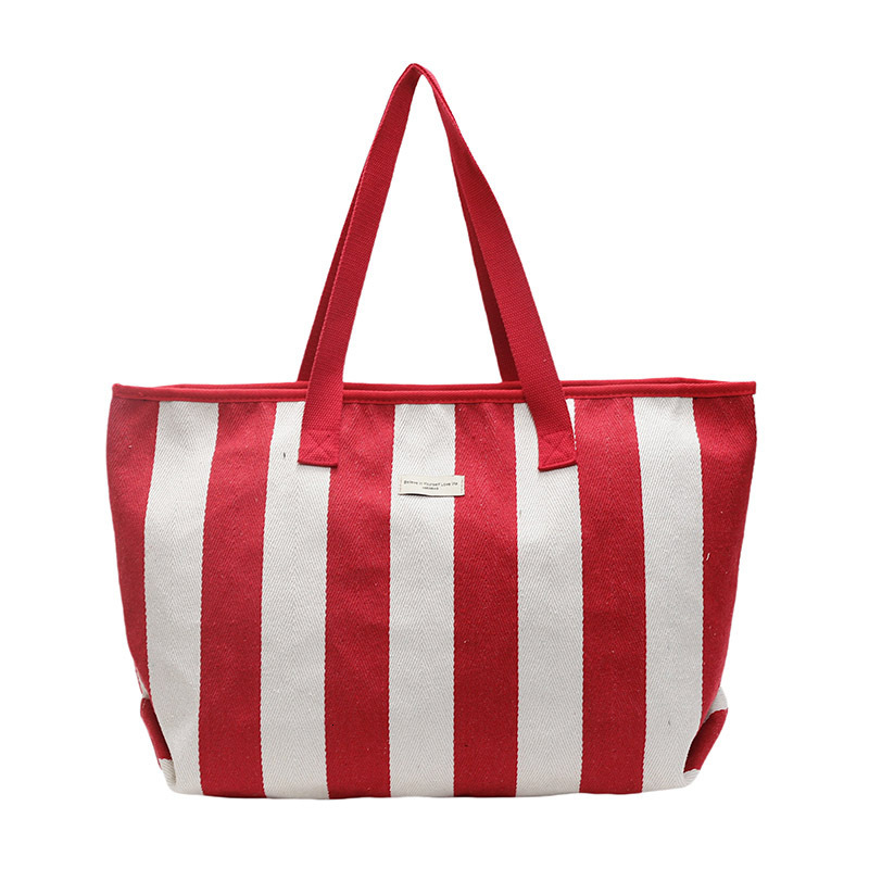 Free shipping designer Striped Canvas Bag for Women 2025 New Simple Versatile Casual Shoulder Bag Large Capacity High-end Commuter Tote Bag