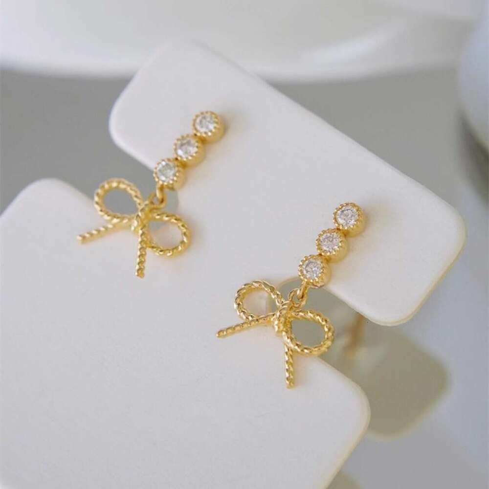 New Style Personality Natural Light Fashion Hollow Bowknot Stud Earrings