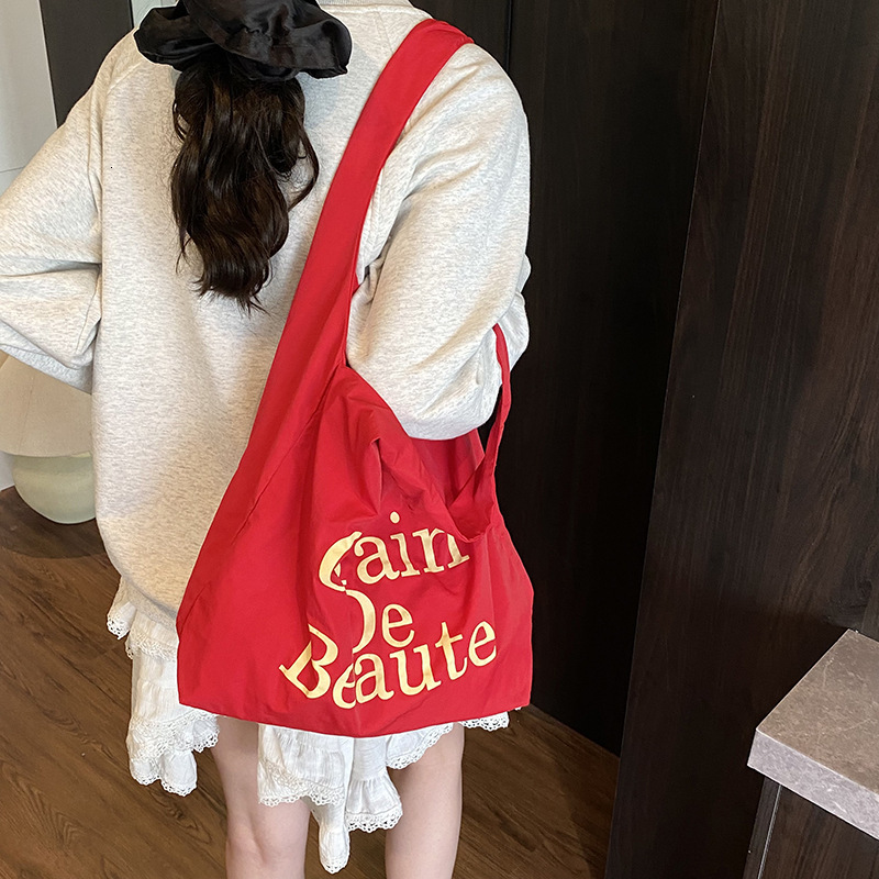 Free shipping designer Canvas Bag for Women Large Capacity 2025 New Lightweight Casual Commuter Shoulder Bag Outdoor Travel High-end Tote Bag