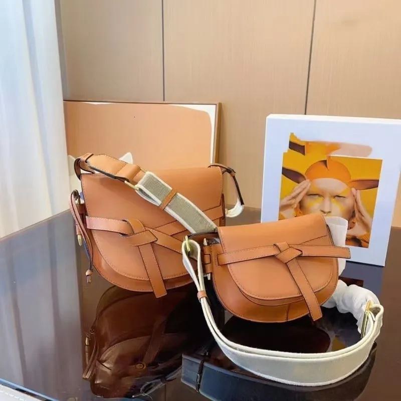 designer bag Saddles Women's Shoulder Handbag High-end Real Cowhide Bow Clamshell Wallet Fashion Alphabet Broadband Sub Crossbody Bag