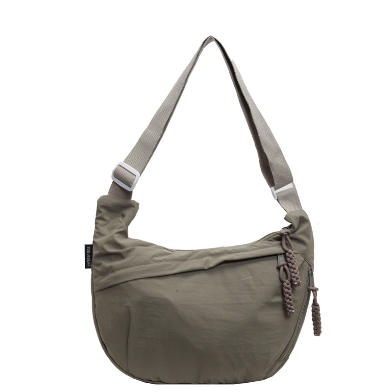 Free shipping designer New Large Capacity Commuter Bag Canvas Bag Versatile Fashion Dumpling Bag Casual Stylish Korean Version Niche Crossbody Bag