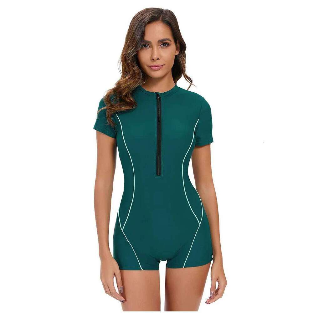 New solid color short sleeved sexy jumpsuit from Europe and America Women's conservative flat angle swimsuit