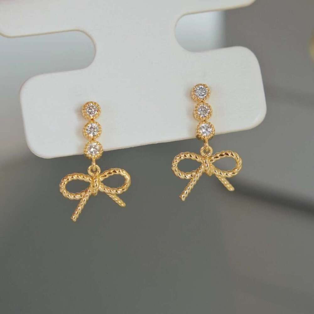 New Style Personality Natural Light Fashion Hollow Bowknot Stud Earrings
