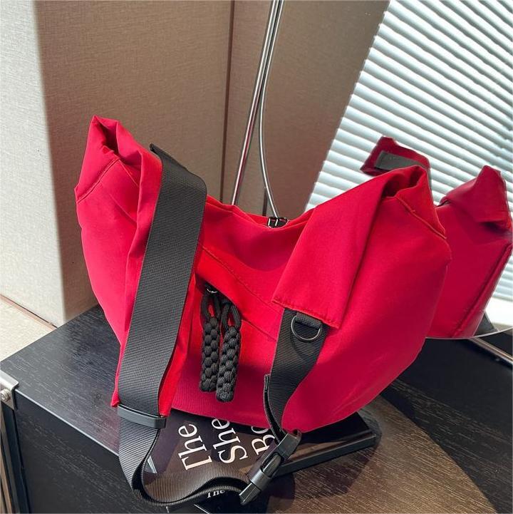 Free shipping designer Casual Versatile Lightweight Canvas Bag New Women Bag Simple Fashion Dumpling Bag Large Capacity Commuter Crossbody Bag