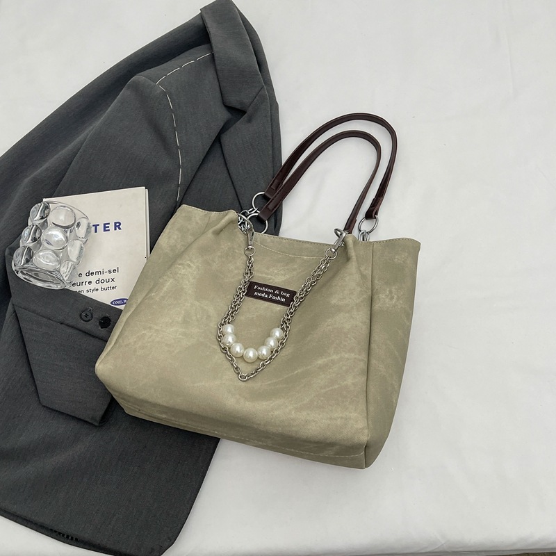 Free shipping designer Bag Korean Style Student Girl Bag 2025 New Simple Fashion Versatile Shoulder Bag Large Capacity Commuter Bag Tote Bag
