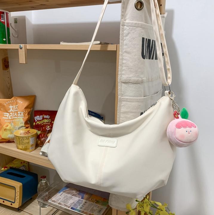 Free shipping designer 2025 New Japanese Style INS Large Capacity Shoulder Bag for Women Casual Dumpling Bag for Students Class Commuting Crossbody Ba
