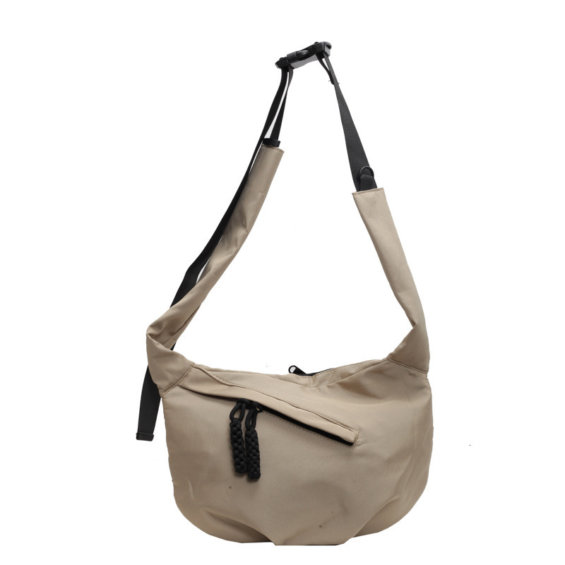 Free shipping designer Casual Versatile Lightweight Canvas Bag New Women Bag Simple Fashion Dumpling Bag Large Capacity Commuter Crossbody Bag