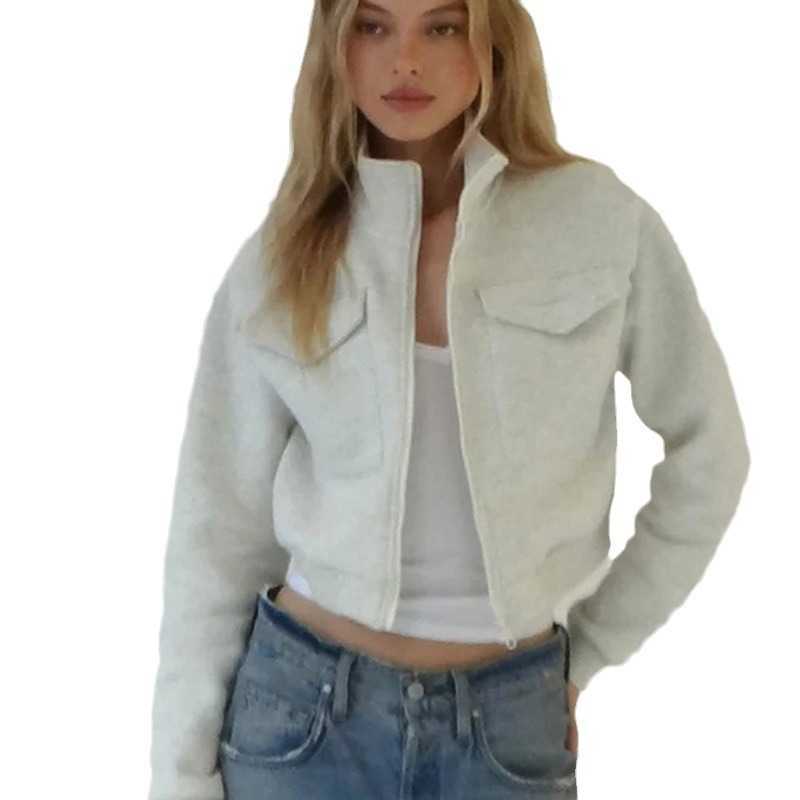 Women's casual fashion European and American style pure color zip-up jacket with pockets and long sleeves for ladies.