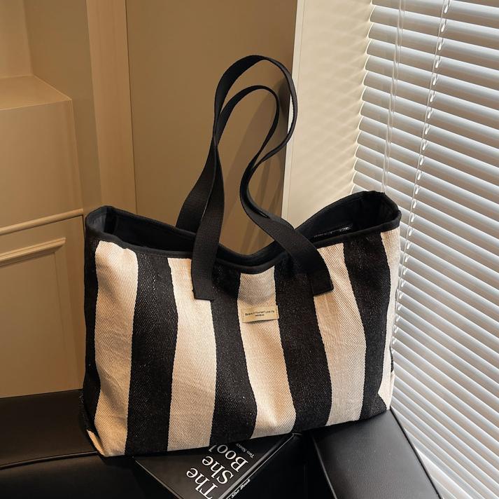 Free shipping designer Striped Canvas Bag for Women 2025 New Simple Versatile Casual Shoulder Bag Large Capacity High-end Commuter Tote Bag