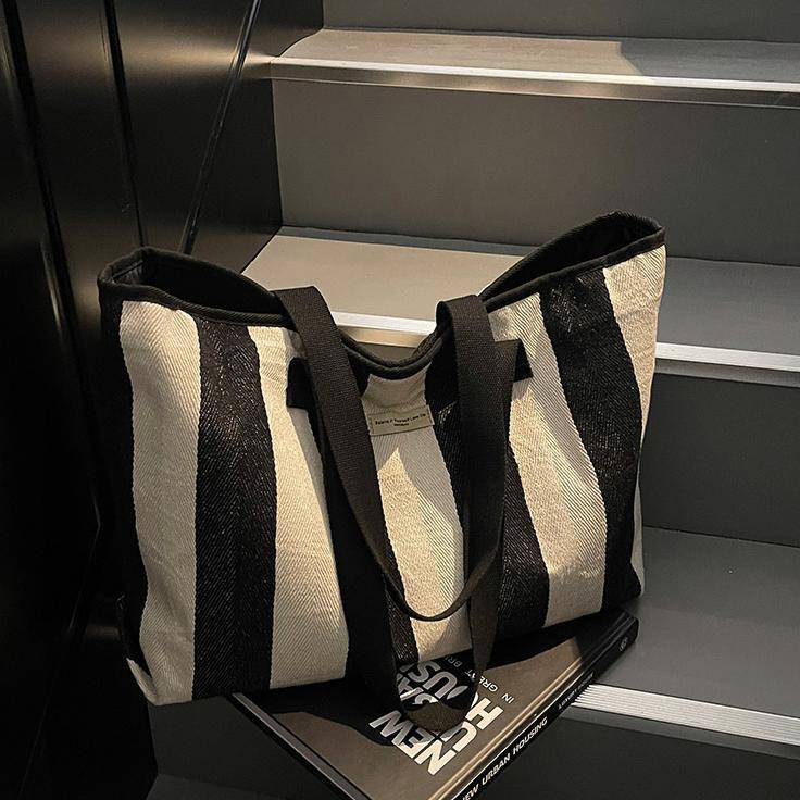 Free shipping designer Striped Canvas Bag for Women 2025 New Simple Versatile Casual Shoulder Bag Large Capacity High-end Commuter Tote Bag