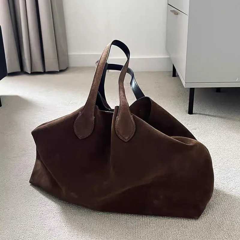 Suede Autumn and Winter Womens Shoulder Bag Niche Design Wing Bag Matte Large Capacity Womens Handheld Tote Bag B250618