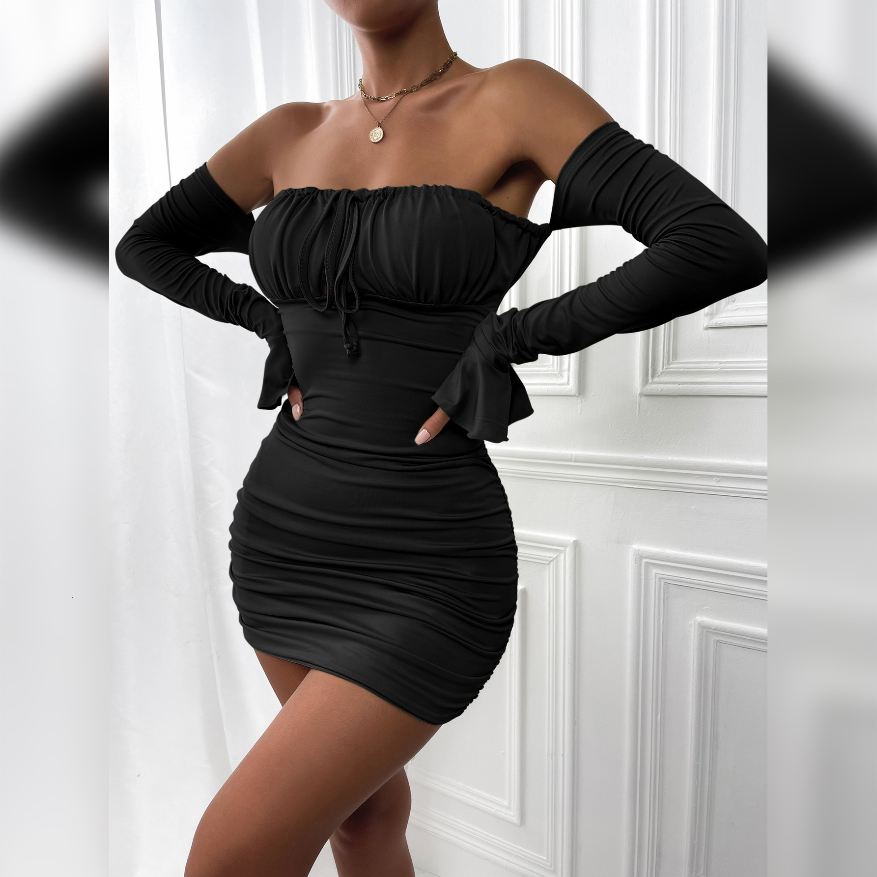 Hot selling womens long sleeved dresses in autumn and winter sexy one collar chest wrapped lace up hip wrapped skirt flared sleeves