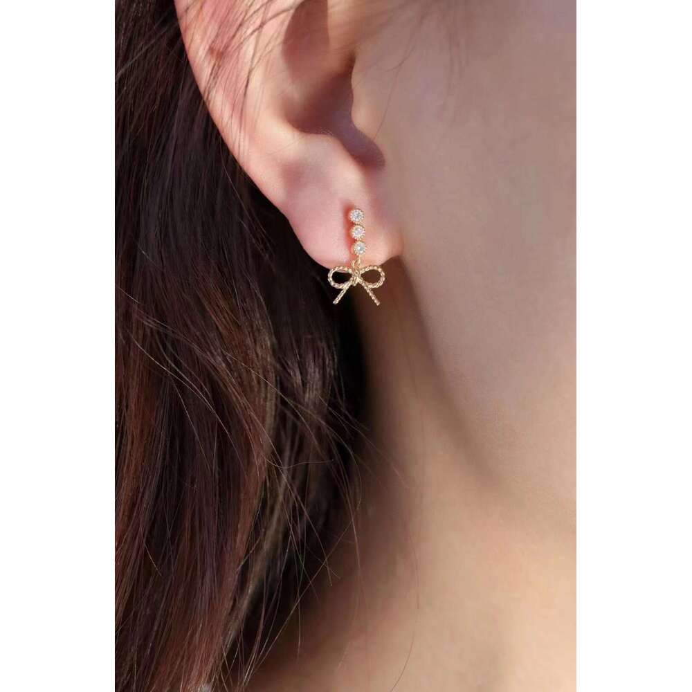 New Style Personality Natural Light Fashion Hollow Bowknot Stud Earrings