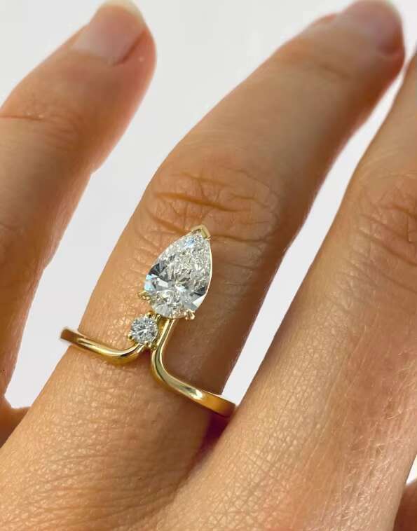 1.06 Ct Elongated Pear Cut Moissanite Engagement Ring Elegant and Durable Wedding Band