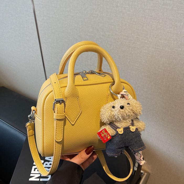 Free shipping designer Bag Niche High-end Handbag Bowling Bag Women Bag 2025 New Retro Fashion Shoulder Bag Textured Versatile Crossbody Bag
