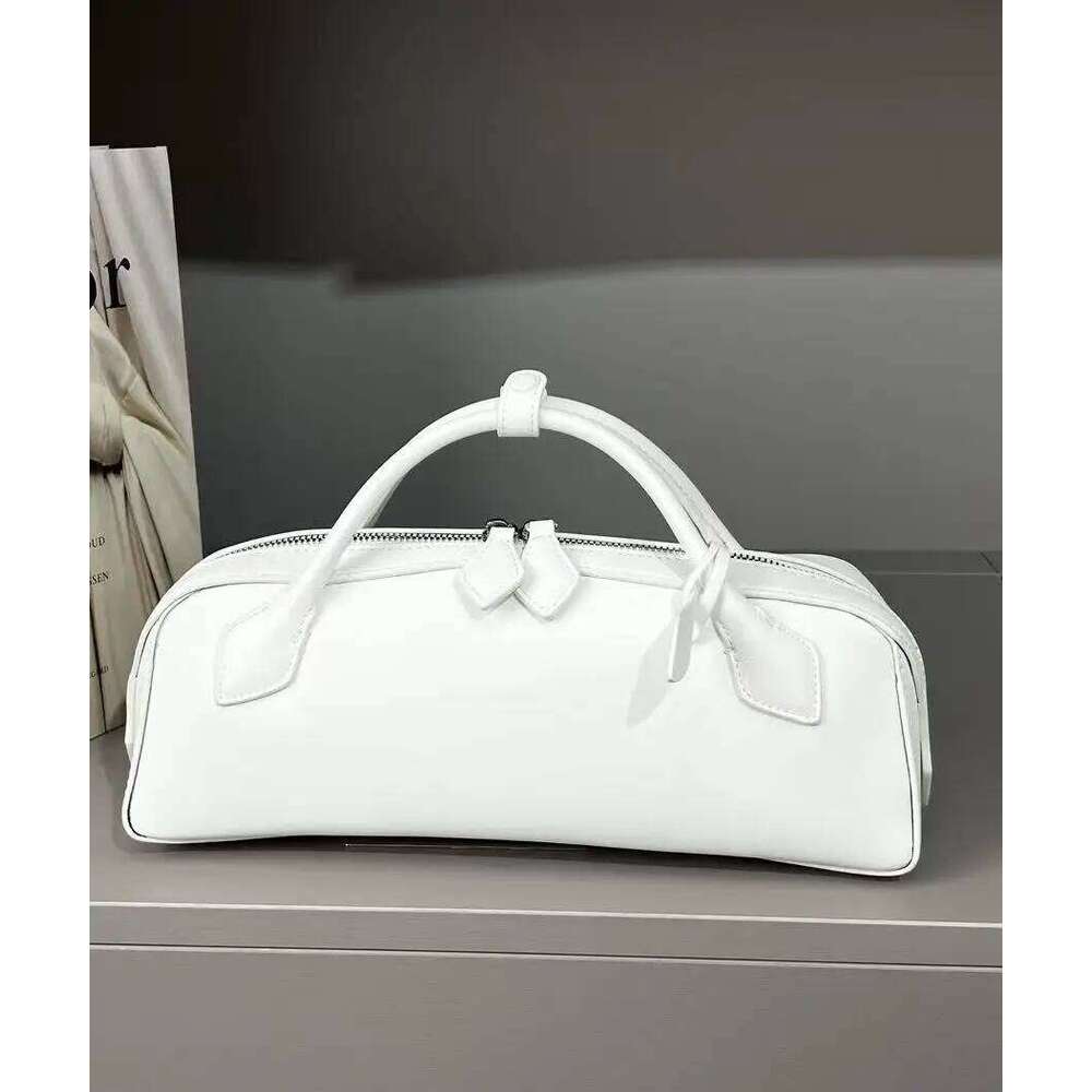Niche Design Cowhide Vintage Sausage Bag Handbag