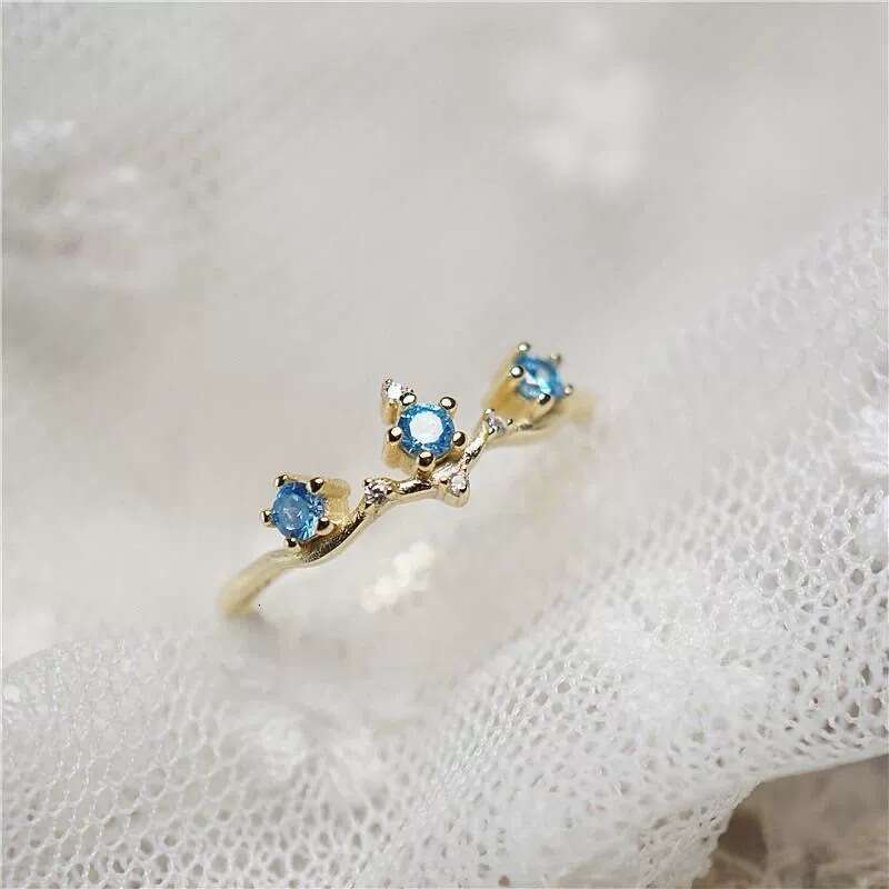 Light Luxury Micro Paved Blue Zircon Open Ring Ins Gold Color Thin Band for Women