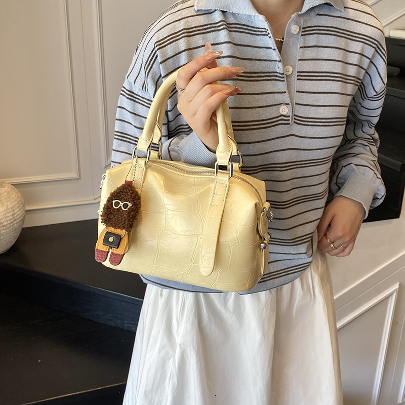 Free shipping designer New 2025 Handheld Stone Pattern Bag for Women Stylish Versatile Shoulder Bag Fashionable Simple Crossbody Bag