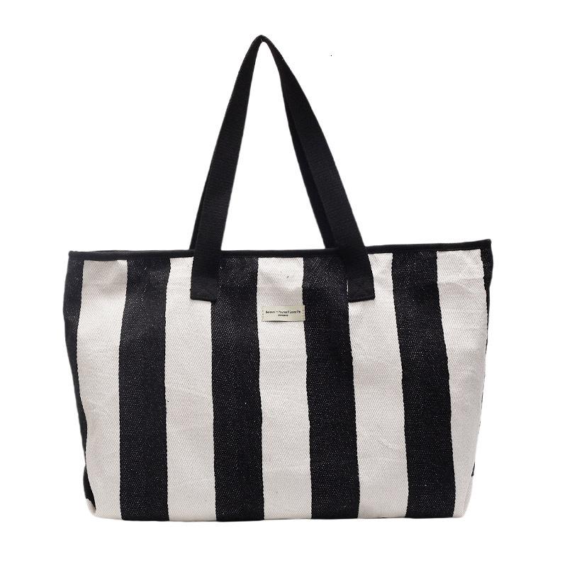 Free shipping designer Striped Canvas Bag for Women 2025 New Simple Versatile Casual Shoulder Bag Large Capacity High-end Commuter Tote Bag
