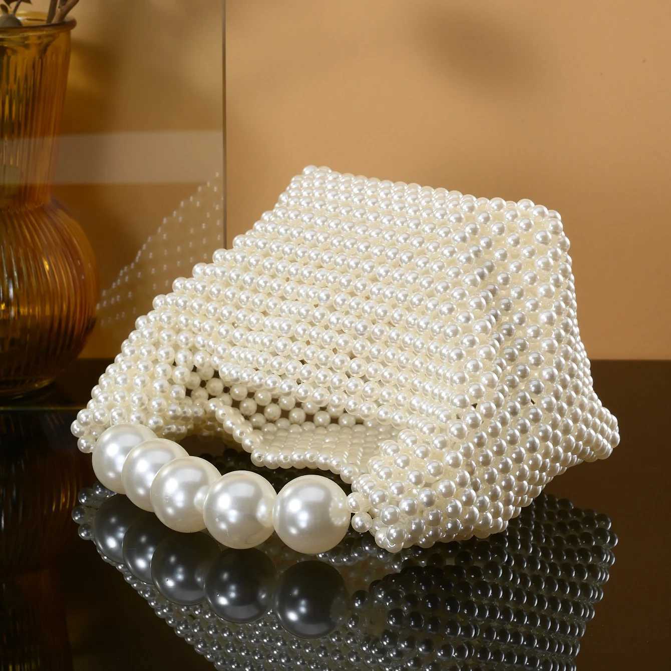 European and American style new beaded handbag Summer womens pearl bag hand woven wrist bag Fashion temperament handbag Z250618