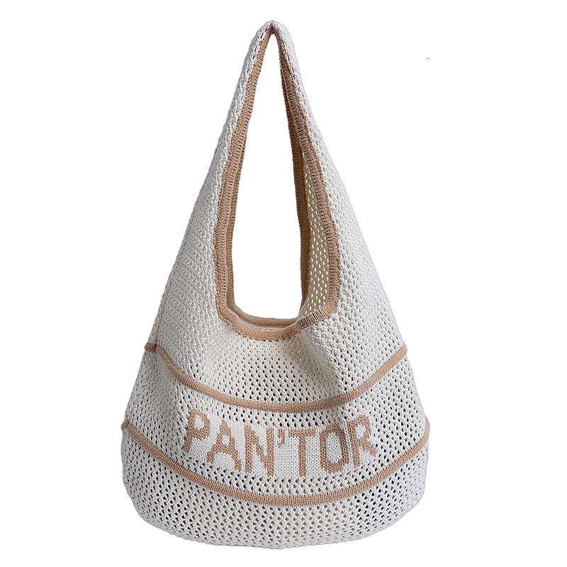 Free shipping designer Woven Bag for Women 2025 Summer New Hollow Design Straw Bag for Beach Commuting Knitted Shoulder Underarm Bag