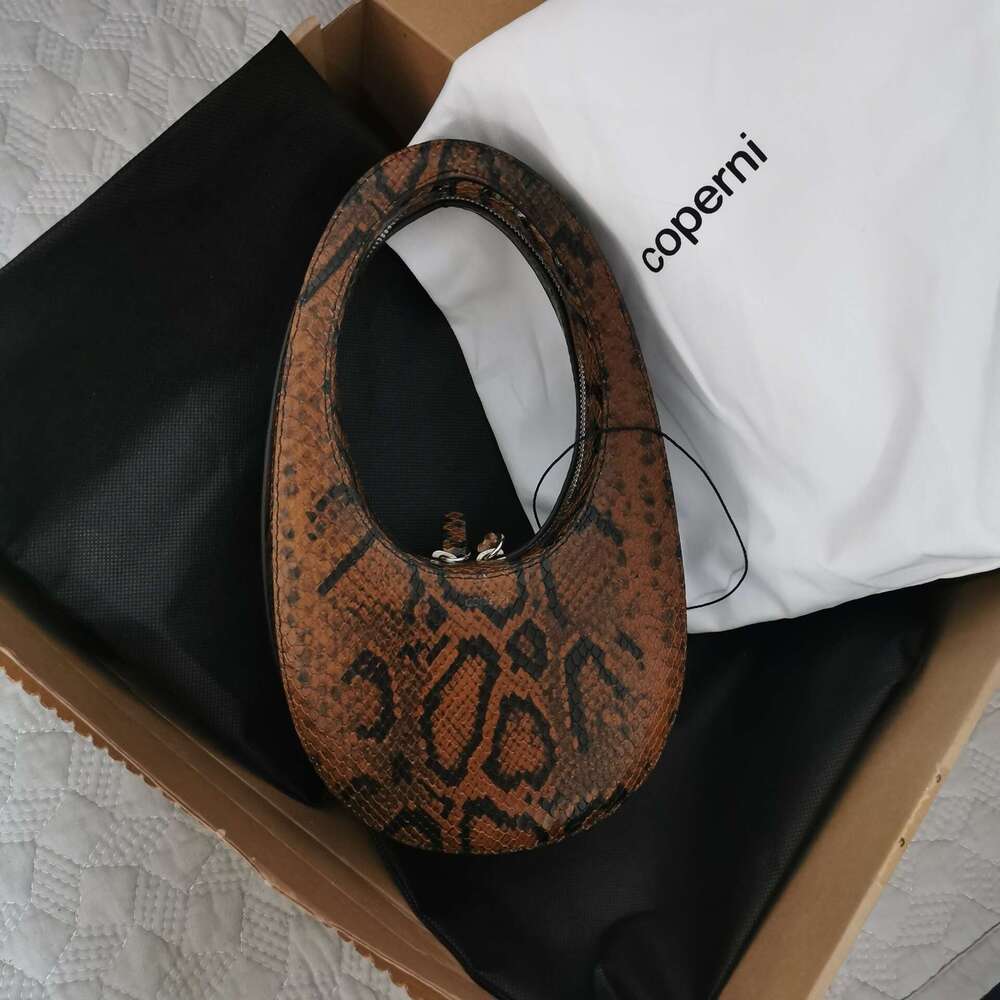 Small retro women's hand-held leather cowhide snake pattern three-dimensional egg and egg bag small round bag