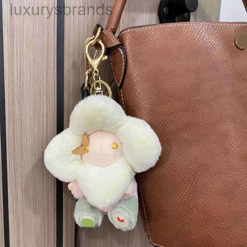 Designer Keychains Fluffy flower doll keychain women cute bag charms key holder beige classical lovely doll pendant keyrings fashion trendy jewelry fa110