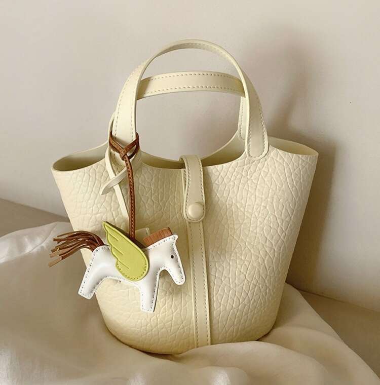 Free shipping fashion designer bag Luxury Milk Bucket for Women Light Yellow Handbag Spring Summer Super Popular Shoulder Crossbody Bag Fashionable an