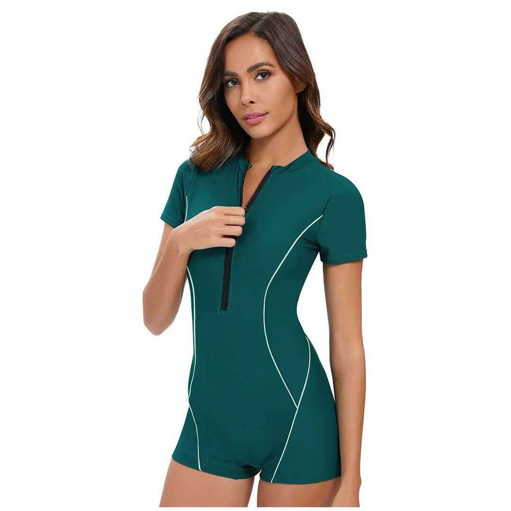 New solid color short sleeved sexy jumpsuit from Europe and America Women's conservative flat angle swimsuit
