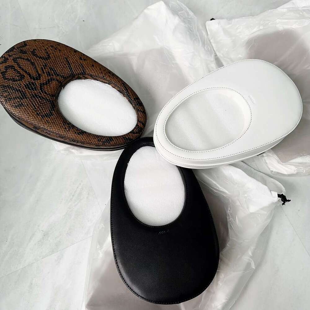 Small retro women's hand-held leather cowhide snake pattern three-dimensional egg and egg bag small round bag