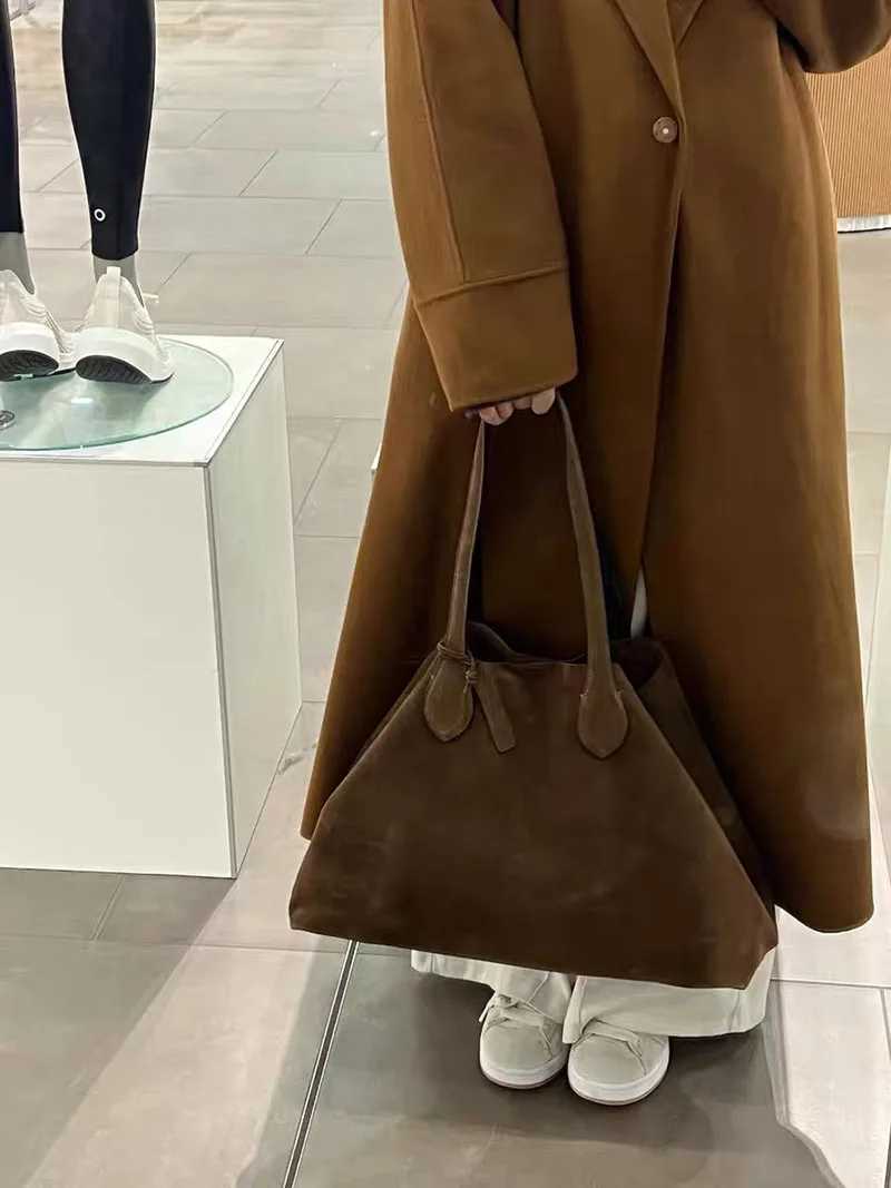 Suede Autumn and Winter Womens Shoulder Bag Niche Design Wing Bag Matte Large Capacity Womens Handheld Tote Bag B250618